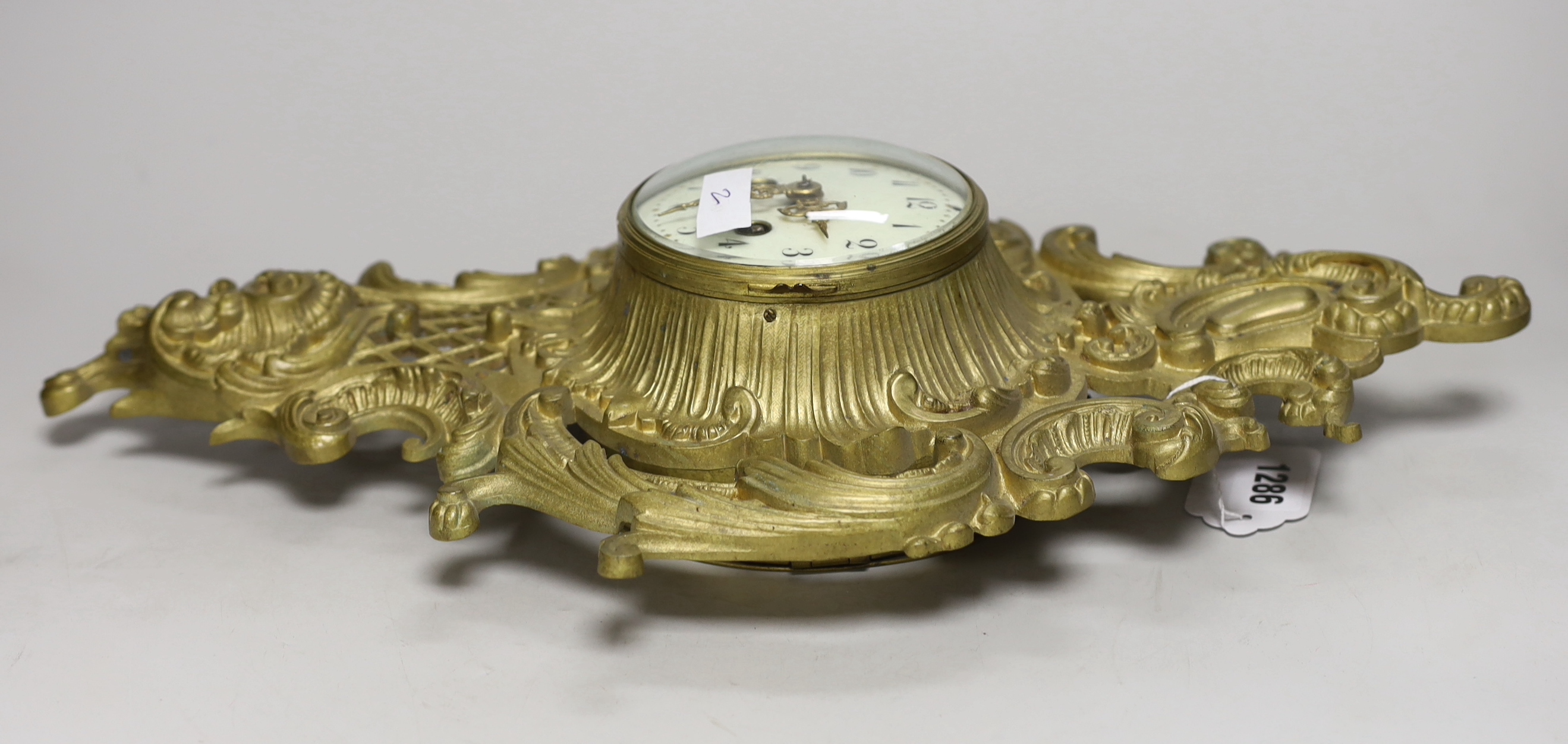 A French brass eight day cartel wall clock, 46cm